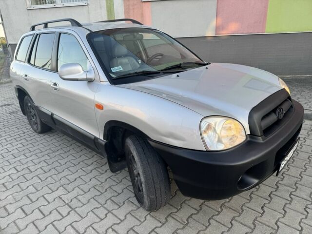 Серый Хендай Санта Фе, объемом двигателя 2 л и пробегом 315 тыс. км за 2950 $, фото 9 на Automoto.ua