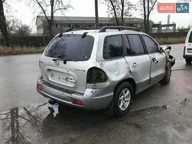 Серый Хендай Санта Фе, объемом двигателя 2 л и пробегом 170 тыс. км за 2500 $, фото 1 на Automoto.ua