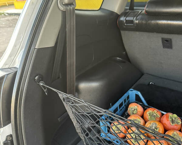 Серый Хендай Санта Фе, объемом двигателя 2.7 л и пробегом 198 тыс. км за 10800 $, фото 16 на Automoto.ua