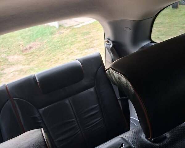 Серый Хендай Санта Фе, объемом двигателя 2.19 л и пробегом 296 тыс. км за 9700 $, фото 11 на Automoto.ua