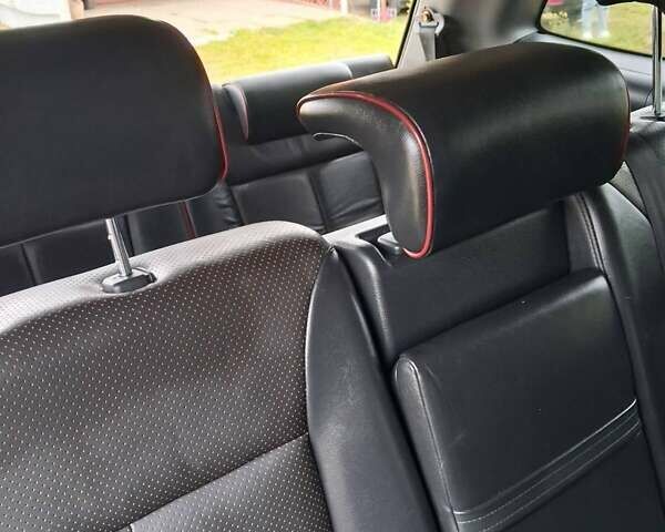 Серый Хендай Санта Фе, объемом двигателя 2.19 л и пробегом 296 тыс. км за 9700 $, фото 13 на Automoto.ua