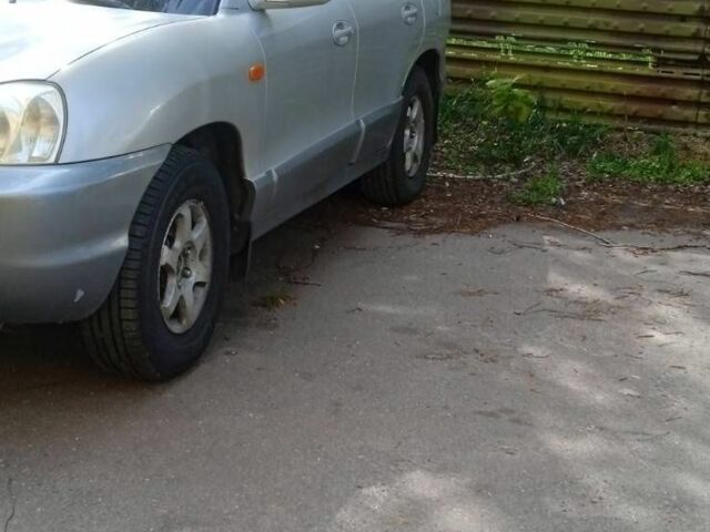 Серый Хендай Санта Фе, объемом двигателя 2 л и пробегом 275 тыс. км за 5500 $, фото 1 на Automoto.ua