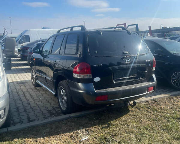 Сірий Хендай Санта Фе, об'ємом двигуна 2.4 л та пробігом 200 тис. км за 3999 $, фото 4 на Automoto.ua