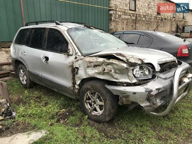 Серый Хендай Санта Фе, объемом двигателя 2 л и пробегом 170 тыс. км за 2500 $, фото 3 на Automoto.ua