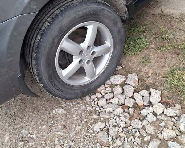 Серый Хендай Санта Фе, объемом двигателя 2.19 л и пробегом 296 тыс. км за 9700 $, фото 6 на Automoto.ua