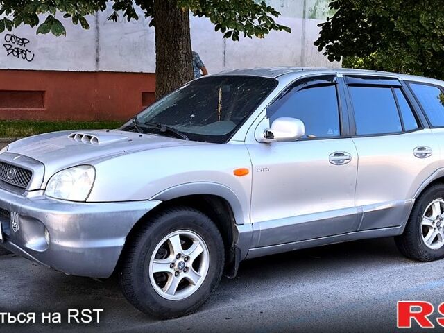 Серый Хендай Санта Фе, объемом двигателя 2 л и пробегом 290 тыс. км за 3500 $, фото 1 на Automoto.ua