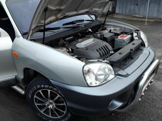 Серый Хендай Санта Фе, объемом двигателя 2 л и пробегом 200 тыс. км за 7650 $, фото 14 на Automoto.ua