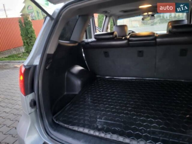 Серый Хендай Санта Фе, объемом двигателя 2.19 л и пробегом 302 тыс. км за 9990 $, фото 101 на Automoto.ua