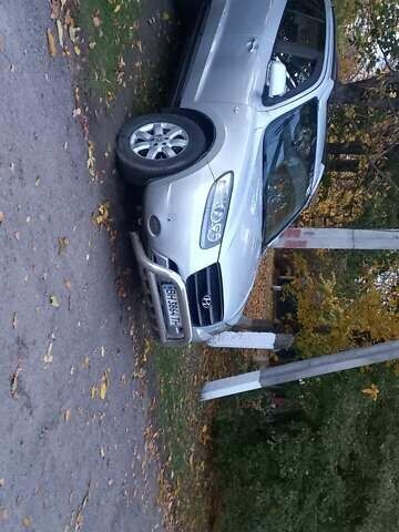 Серый Хендай Санта Фе, объемом двигателя 2.19 л и пробегом 258 тыс. км за 8600 $, фото 6 на Automoto.ua