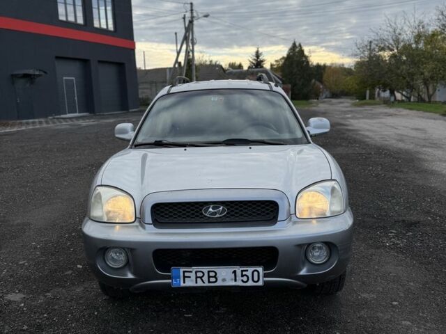 Серый Хендай Санта Фе, объемом двигателя 2 л и пробегом 200 тыс. км за 3000 $, фото 2 на Automoto.ua