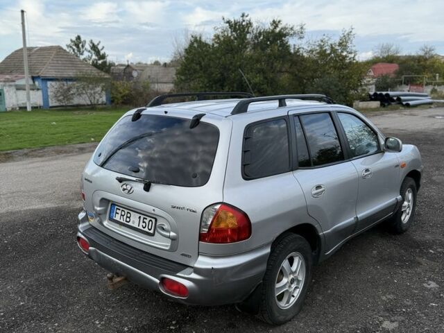 Серый Хендай Санта Фе, объемом двигателя 2 л и пробегом 200 тыс. км за 3000 $, фото 4 на Automoto.ua