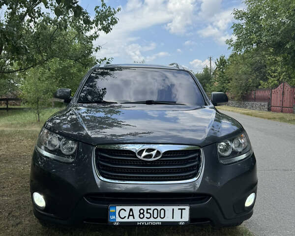 Серый Хендай Санта Фе, объемом двигателя 2.4 л и пробегом 226 тыс. км за 11700 $, фото 3 на Automoto.ua