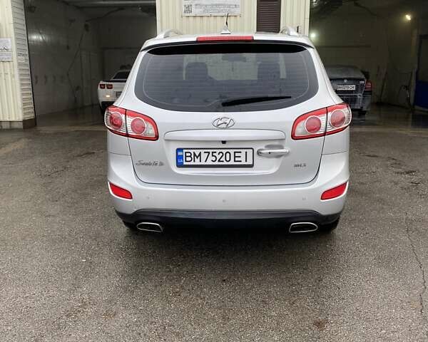 Серый Хендай Санта Фе, объемом двигателя 2 л и пробегом 92 тыс. км за 11900 $, фото 2 на Automoto.ua