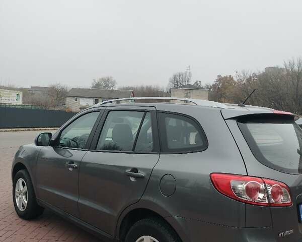 Серый Хендай Санта Фе, объемом двигателя 2.36 л и пробегом 140 тыс. км за 9900 $, фото 5 на Automoto.ua