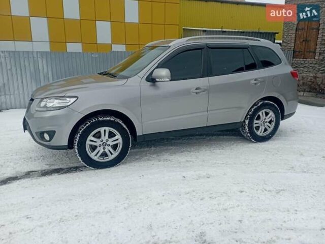 Серый Хендай Санта Фе, объемом двигателя 2.36 л и пробегом 190 тыс. км за 11500 $, фото 3 на Automoto.ua