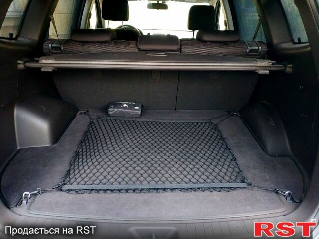 Серый Хендай Санта Фе, объемом двигателя 2.2 л и пробегом 294 тыс. км за 11500 $, фото 9 на Automoto.ua