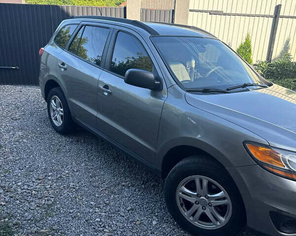 Серый Хендай Санта Фе, объемом двигателя 2.36 л и пробегом 176 тыс. км за 11500 $, фото 1 на Automoto.ua