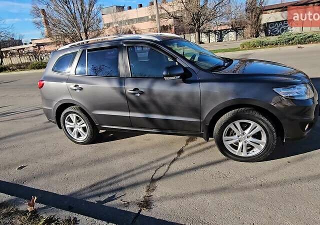 Серый Хендай Санта Фе, объемом двигателя 2.36 л и пробегом 220 тыс. км за 11799 $, фото 9 на Automoto.ua