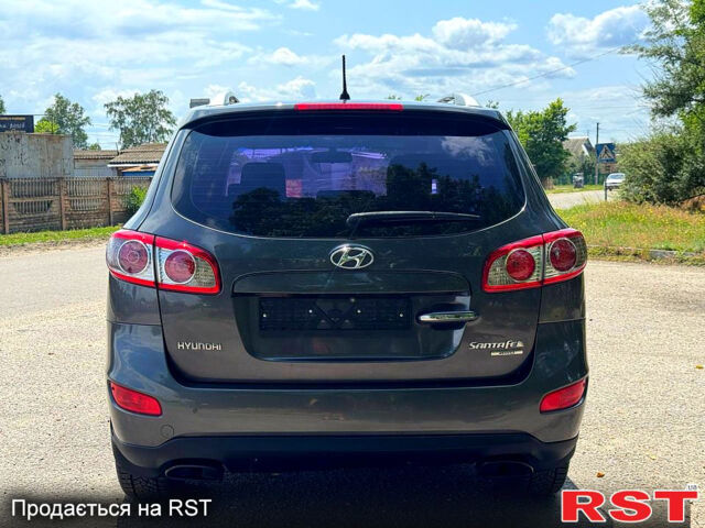 Серый Хендай Санта Фе, объемом двигателя 2.4 л и пробегом 170 тыс. км за 11450 $, фото 4 на Automoto.ua