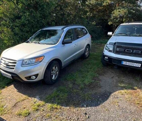 Серый Хендай Санта Фе, объемом двигателя 2.4 л и пробегом 166 тыс. км за 11000 $, фото 1 на Automoto.ua