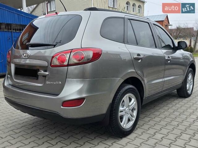 Серый Хендай Санта Фе, объемом двигателя 2.4 л и пробегом 237 тыс. км за 9999 $, фото 19 на Automoto.ua