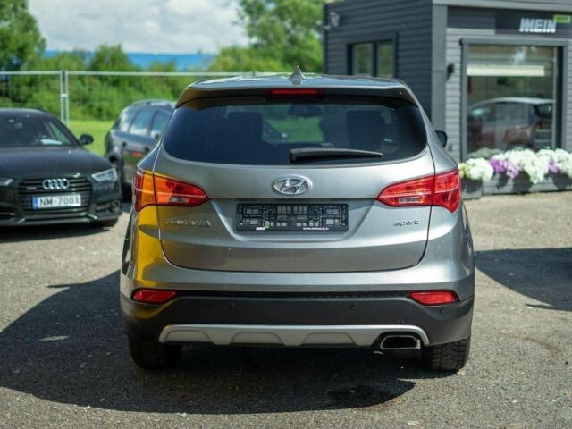 Серый Хендай Санта Фе, объемом двигателя 2.4 л и пробегом 146 тыс. км за 8300 $, фото 3 на Automoto.ua