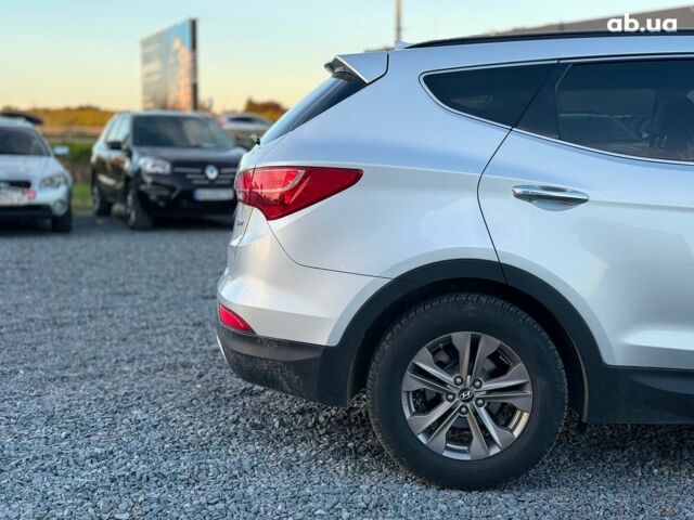 Серый Хендай Санта Фе, объемом двигателя 2.4 л и пробегом 173 тыс. км за 12390 $, фото 5 на Automoto.ua