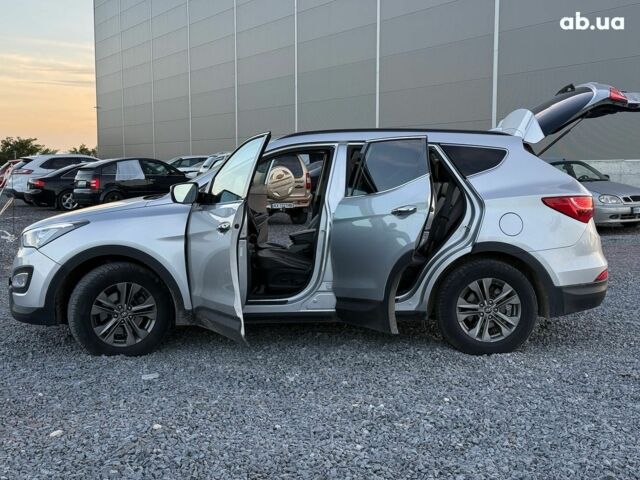 Серый Хендай Санта Фе, объемом двигателя 2.4 л и пробегом 173 тыс. км за 12390 $, фото 25 на Automoto.ua