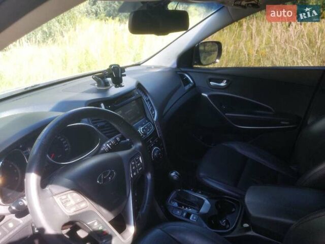 Серый Хендай Санта Фе, объемом двигателя 2.36 л и пробегом 157 тыс. км за 17500 $, фото 6 на Automoto.ua