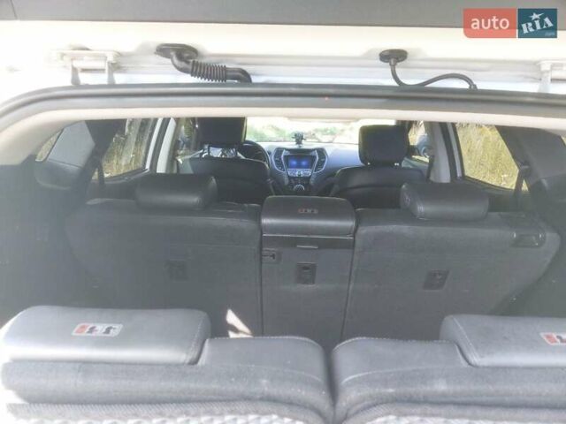 Серый Хендай Санта Фе, объемом двигателя 2.36 л и пробегом 157 тыс. км за 17500 $, фото 10 на Automoto.ua