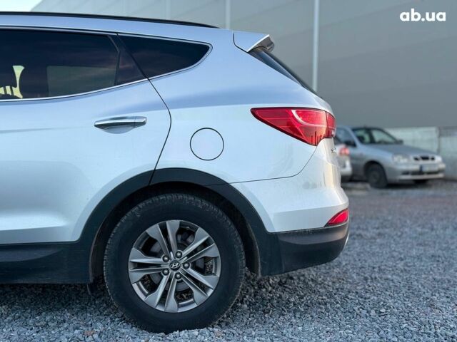 Серый Хендай Санта Фе, объемом двигателя 2.4 л и пробегом 173 тыс. км за 12390 $, фото 11 на Automoto.ua