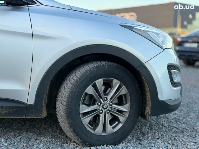 Серый Хендай Санта Фе, объемом двигателя 2.4 л и пробегом 173 тыс. км за 12390 $, фото 6 на Automoto.ua