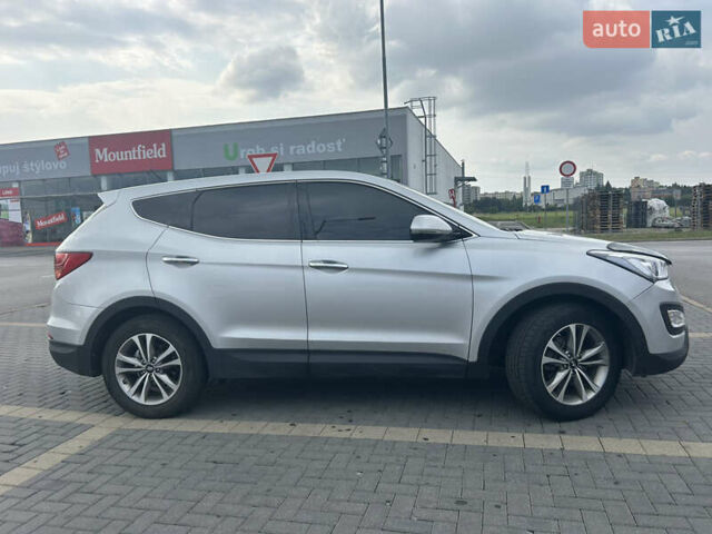 Серый Хендай Санта Фе, объемом двигателя 2 л и пробегом 93 тыс. км за 17204 $, фото 2 на Automoto.ua