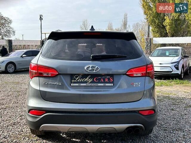 Серый Хендай Санта Фе, объемом двигателя 2 л и пробегом 129 тыс. км за 19000 $, фото 5 на Automoto.ua
