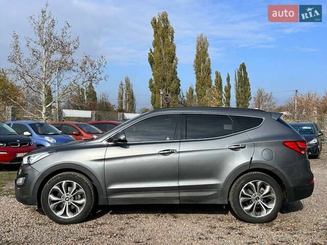 Серый Хендай Санта Фе, объемом двигателя 2 л и пробегом 129 тыс. км за 19000 $, фото 7 на Automoto.ua