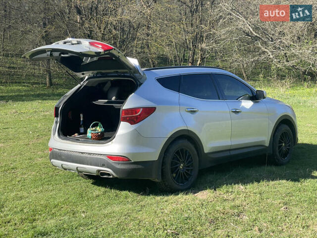 Серый Хендай Санта Фе, объемом двигателя 2.36 л и пробегом 113 тыс. км за 17000 $, фото 11 на Automoto.ua