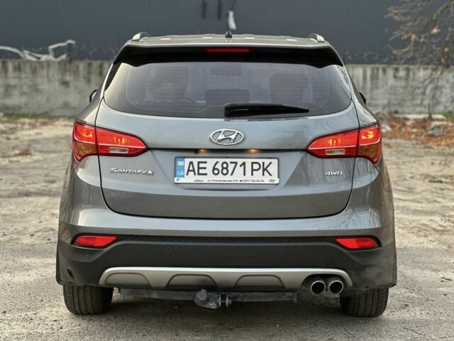 Серый Хендай Санта Фе, объемом двигателя 2.4 л и пробегом 147 тыс. км за 17399 $, фото 2 на Automoto.ua
