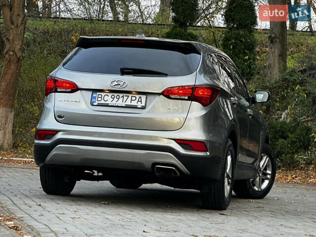 Серый Хендай Санта Фе, объемом двигателя 2.36 л и пробегом 147 тыс. км за 14700 $, фото 57 на Automoto.ua