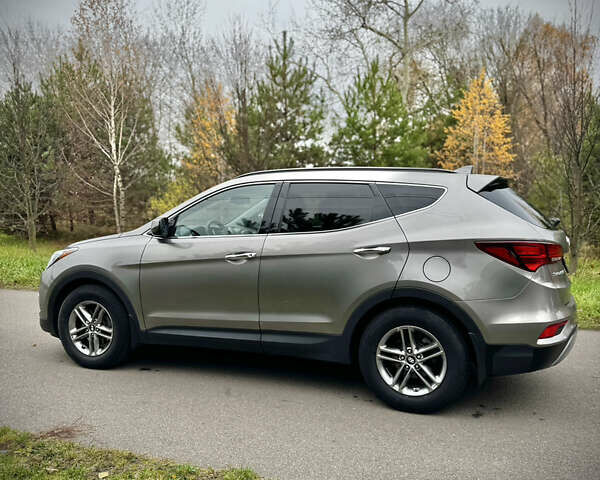 Серый Хендай Санта Фе, объемом двигателя 2.36 л и пробегом 133 тыс. км за 13800 $, фото 4 на Automoto.ua