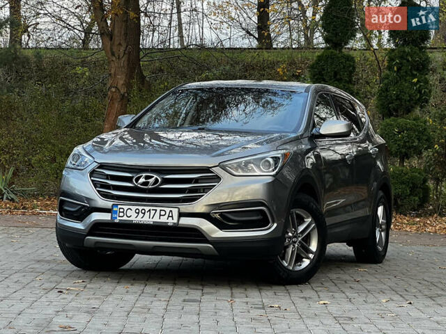 Серый Хендай Санта Фе, объемом двигателя 2.36 л и пробегом 147 тыс. км за 14700 $, фото 2 на Automoto.ua