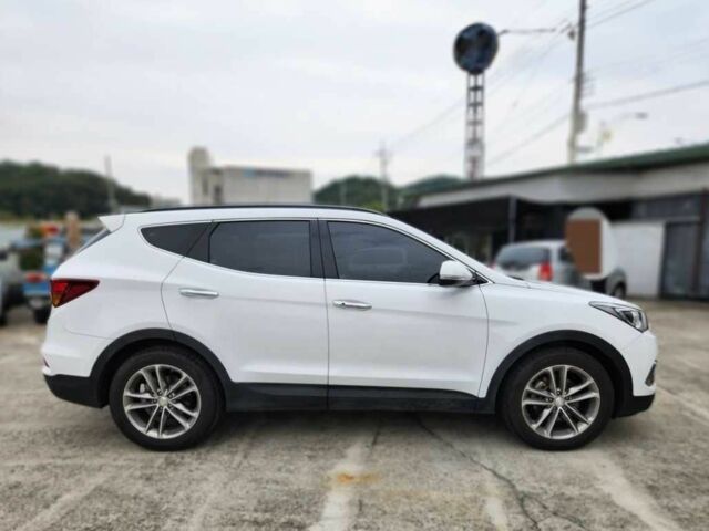 Серый Хендай Санта Фе, объемом двигателя 2 л и пробегом 76 тыс. км за 7999 $, фото 3 на Automoto.ua