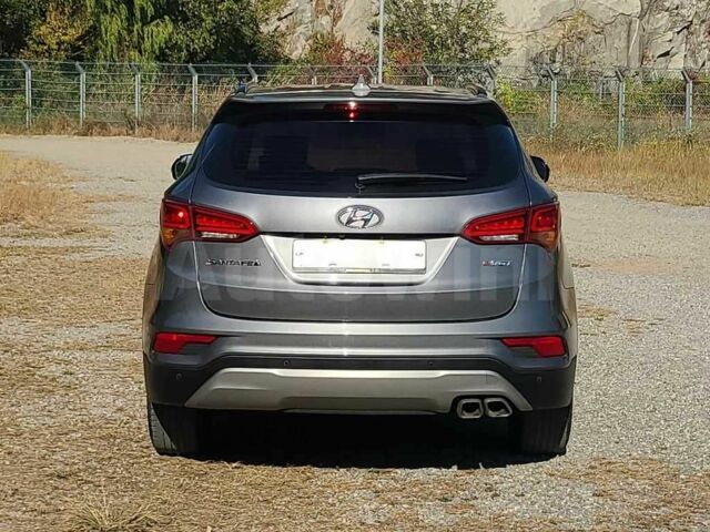 Серый Хендай Санта Фе, объемом двигателя 2 л и пробегом 54 тыс. км за 11700 $, фото 3 на Automoto.ua