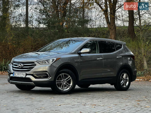 Серый Хендай Санта Фе, объемом двигателя 2.36 л и пробегом 147 тыс. км за 14700 $, фото 4 на Automoto.ua