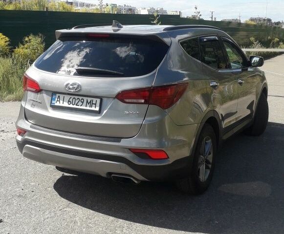 Серый Хендай Санта Фе, объемом двигателя 2.4 л и пробегом 160 тыс. км за 13000 $, фото 4 на Automoto.ua