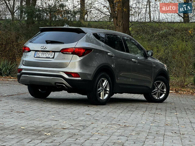 Серый Хендай Санта Фе, объемом двигателя 2.36 л и пробегом 147 тыс. км за 14700 $, фото 56 на Automoto.ua