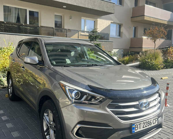 Серый Хендай Санта Фе, объемом двигателя 2.36 л и пробегом 145 тыс. км за 13500 $, фото 1 на Automoto.ua