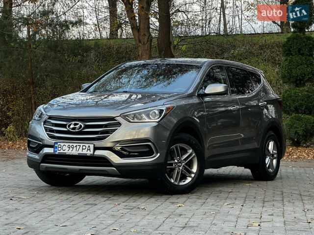 Серый Хендай Санта Фе, объемом двигателя 2.36 л и пробегом 147 тыс. км за 14700 $, фото 3 на Automoto.ua
