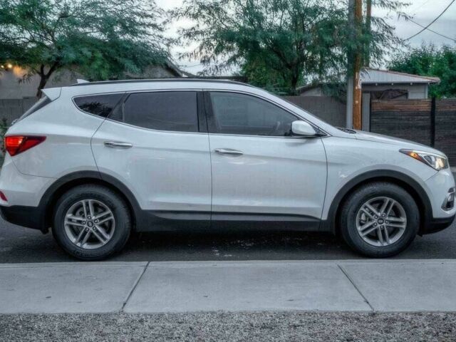 Серый Хендай Санта Фе, объемом двигателя 2.4 л и пробегом 54 тыс. км за 11500 $, фото 3 на Automoto.ua