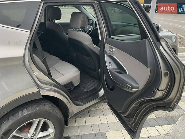 Серый Хендай Санта Фе, объемом двигателя 2.36 л и пробегом 97 тыс. км за 12700 $, фото 6 на Automoto.ua