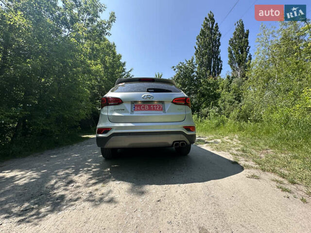 Серый Хендай Санта Фе, объемом двигателя 2 л и пробегом 150 тыс. км за 21899 $, фото 9 на Automoto.ua